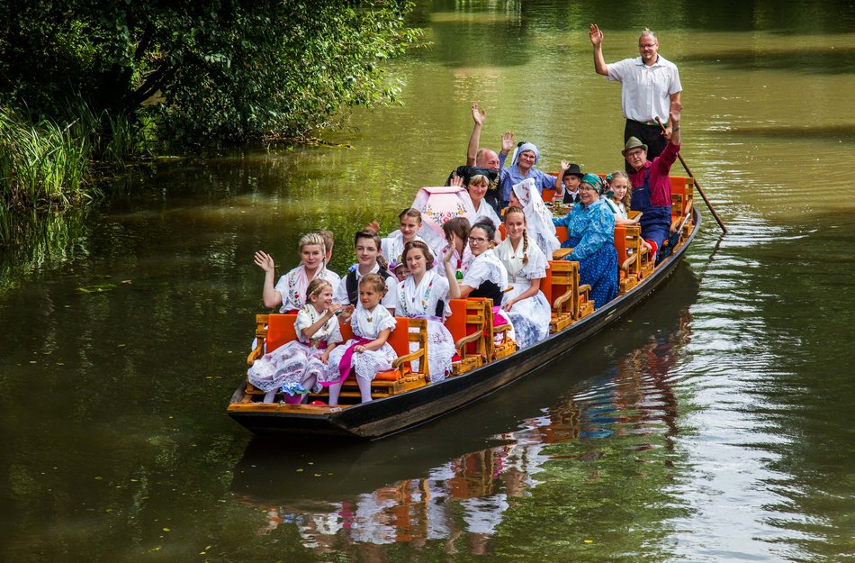 Boat trip in Spreewald river with women in traditional costumes