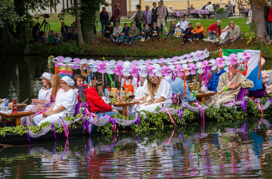 Festival parade barge decorated with garlands in the Spree Forest