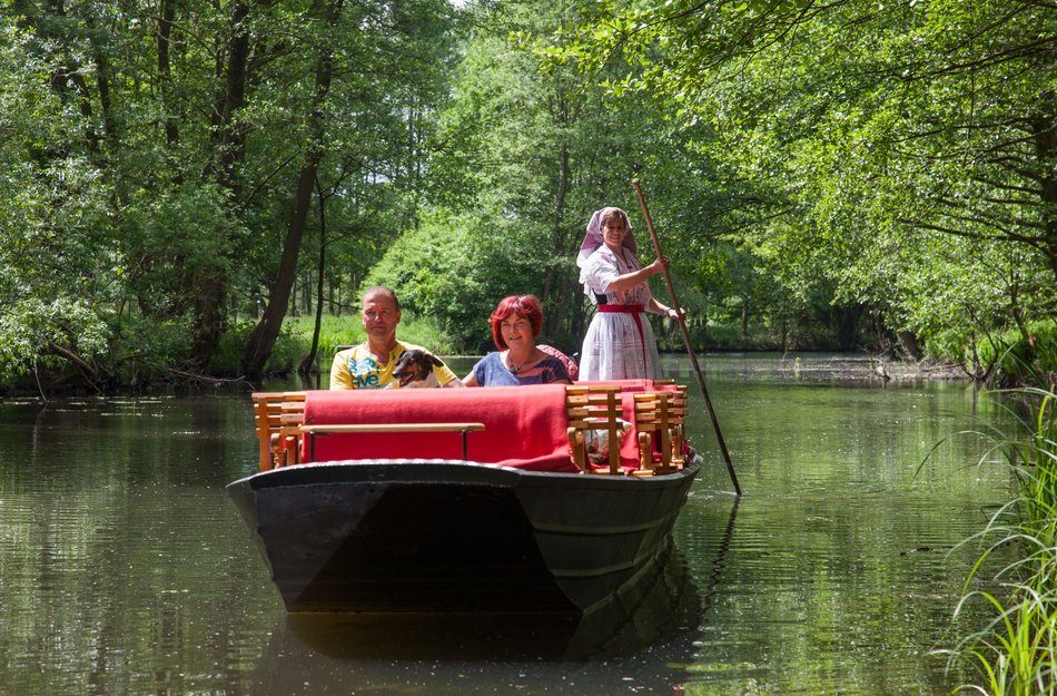 Barge ride in the Spreewald river with two people and the barge driver
